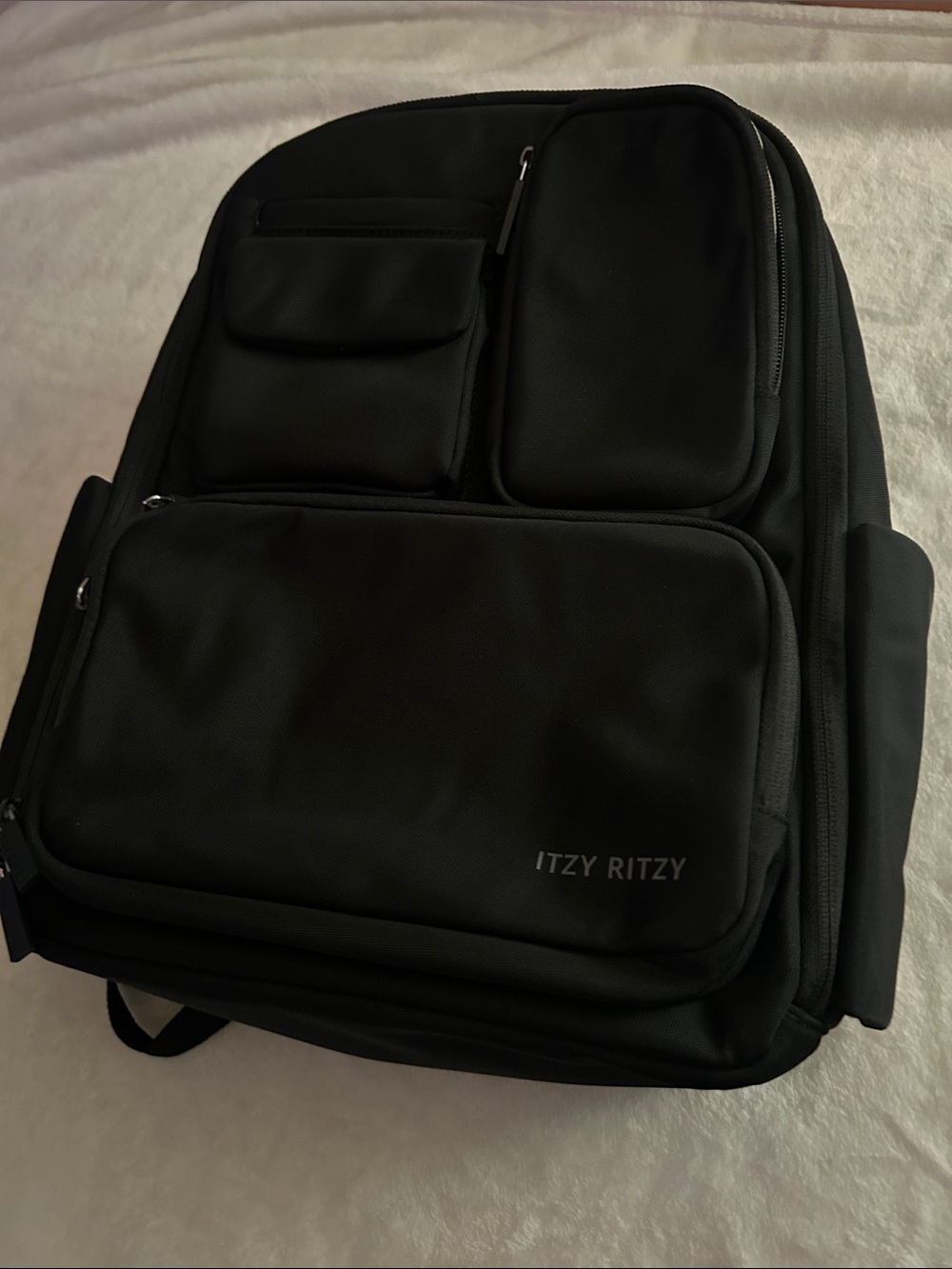 Itzy Ritzy Black Men's Travel Backpack with Multiple Front Pockets